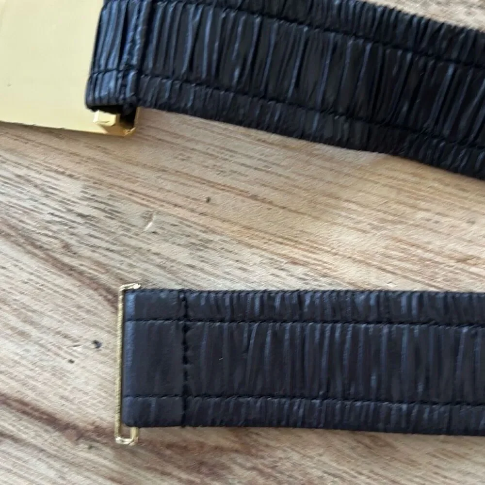 Michael Kors classic logo black and gold belt size small/medium